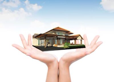 hands-with-luxurious-house